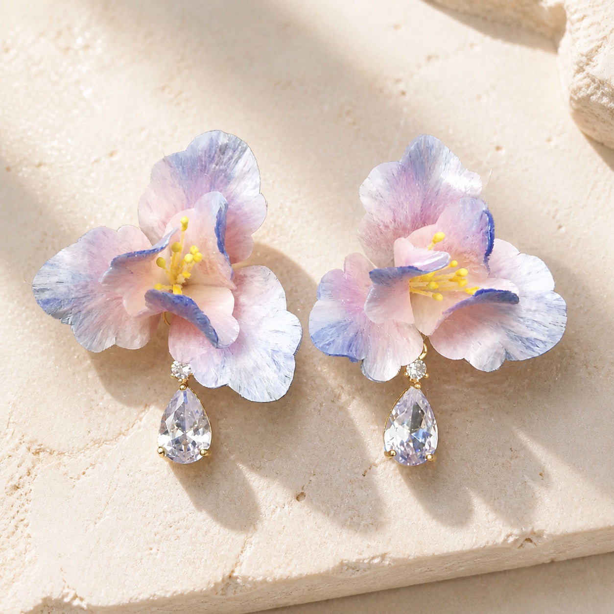 Pair of blush blue iris Ronghua earrings with clear zircon drops