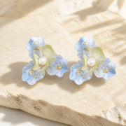 Pair of frosted blue iris Ronghua silk flower stud earrings